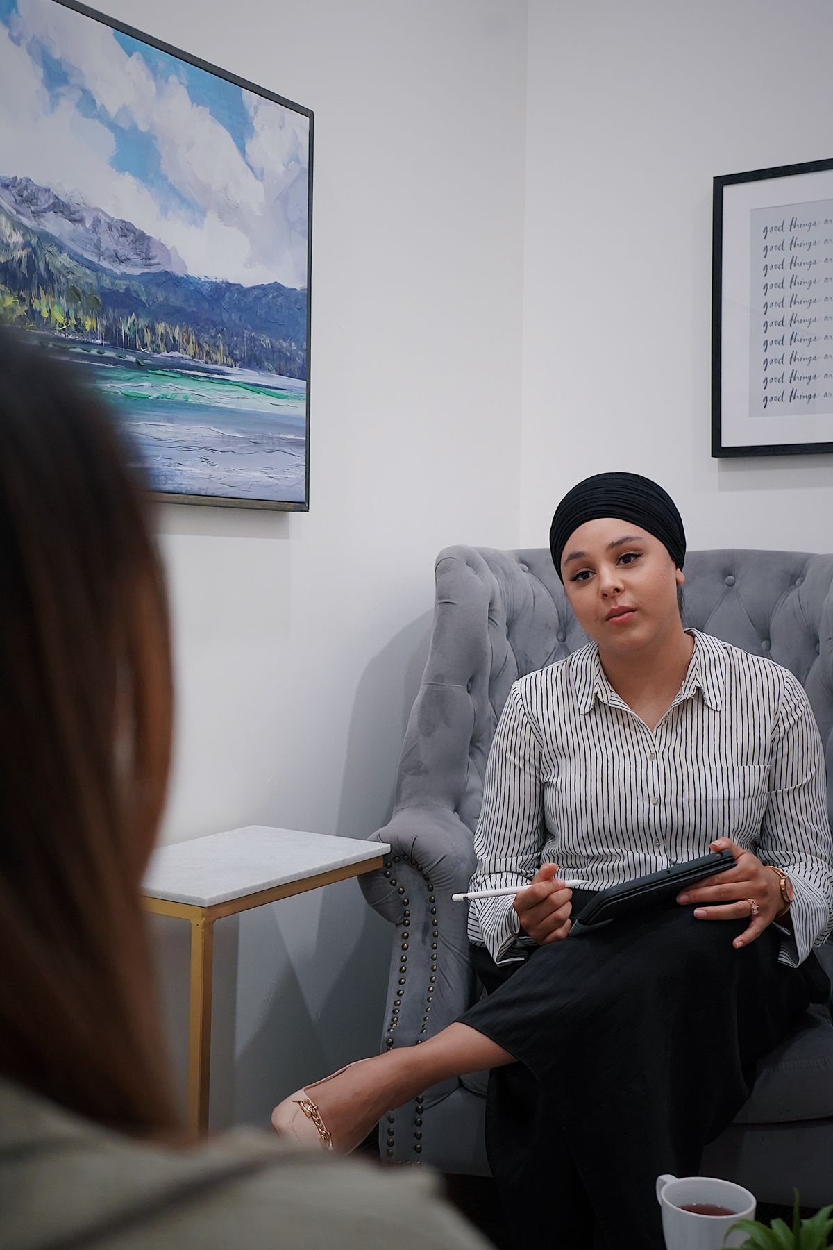 Therapist and client in a supportive counselling session